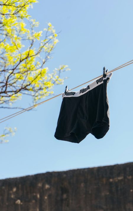 Boxer shorts drying on a clothesline in the sun